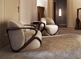 Modern armchairs with wooden frames in a stylish room.